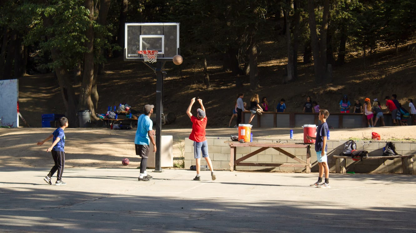 Campers playing basketball 