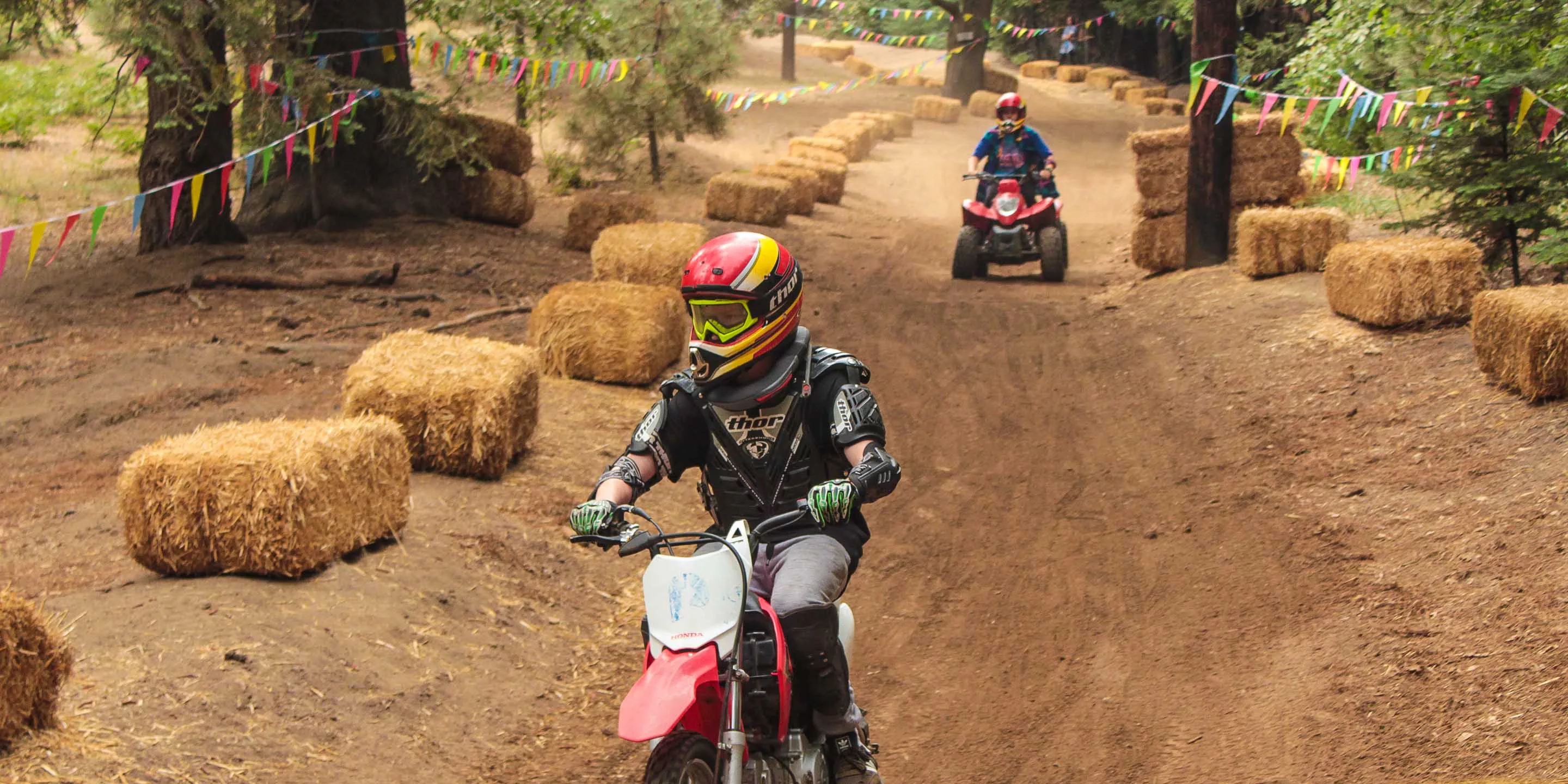 Custom dirt track with ATV and dirt bike