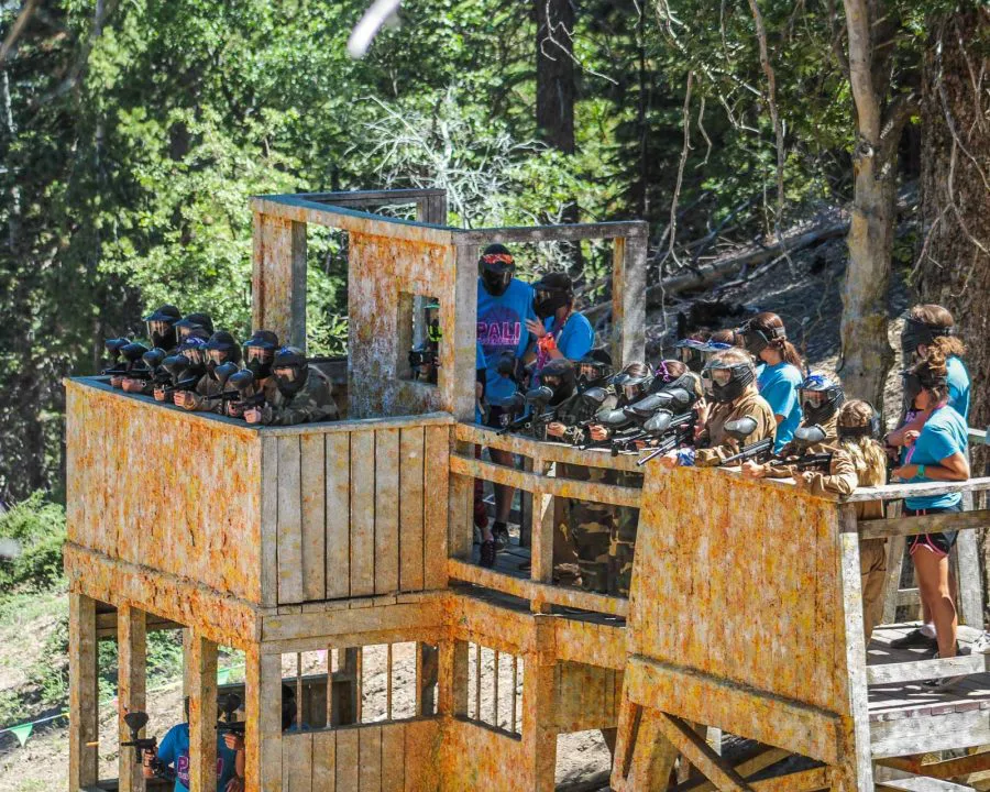 Large group of campers on paintball structure