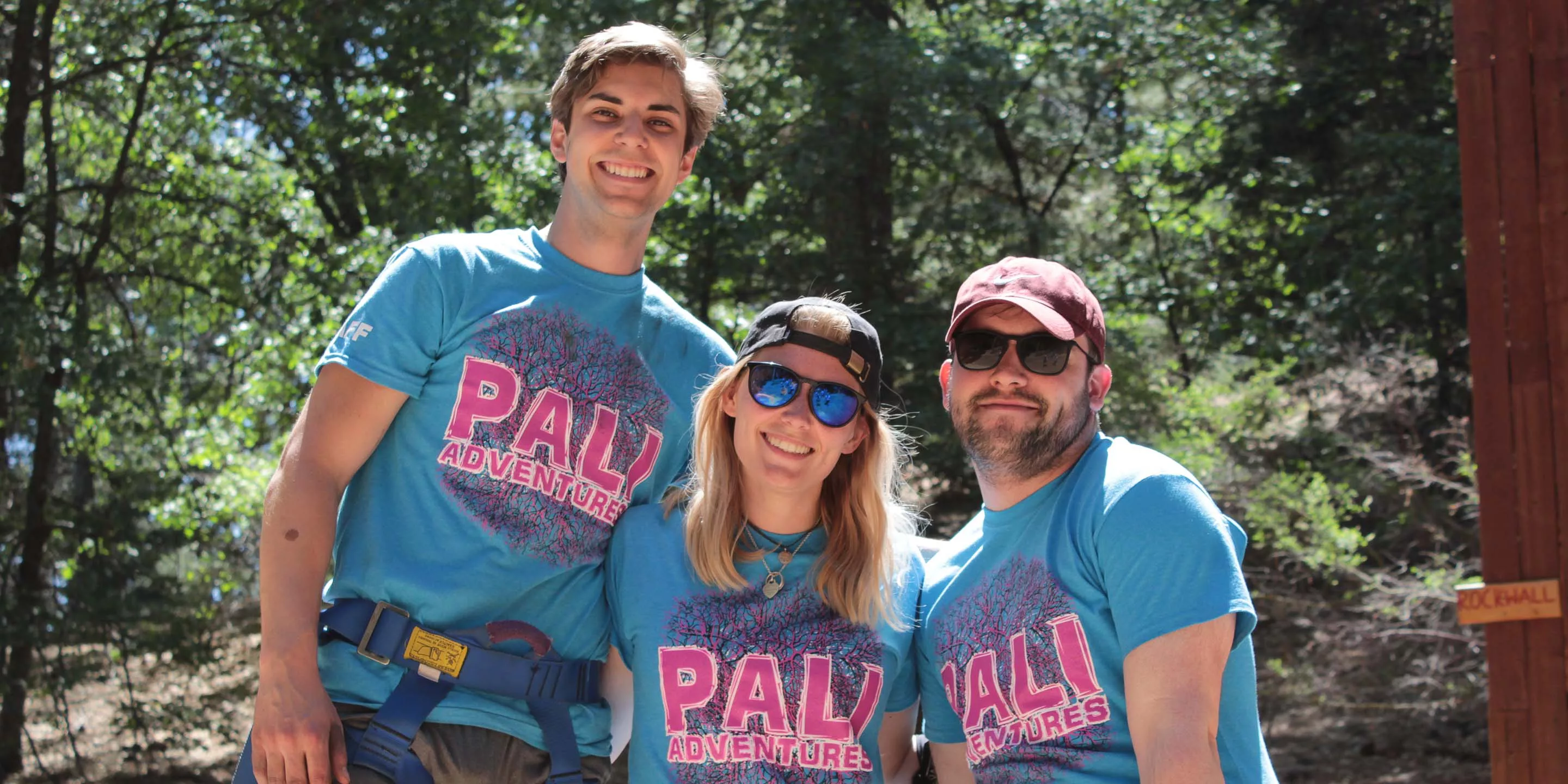 Three Pali staff wearing harnesses