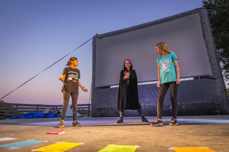 kids practicing their acting on stage