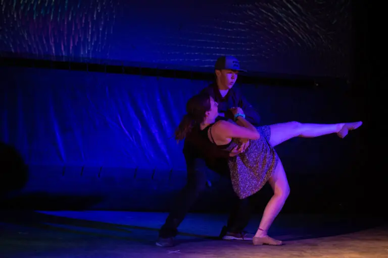 a boy and girl dancing