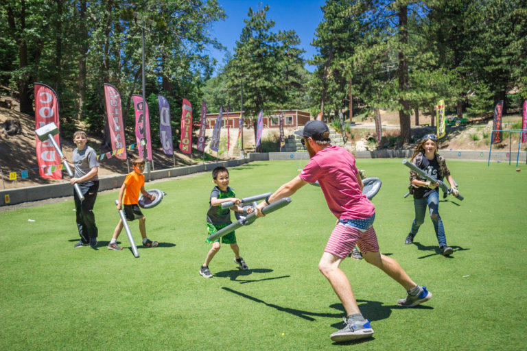 kids engaging in live action role play at camp