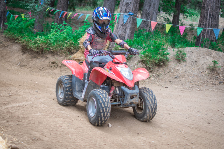 a camper riding an ATV