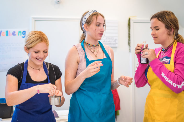 girls making candles together