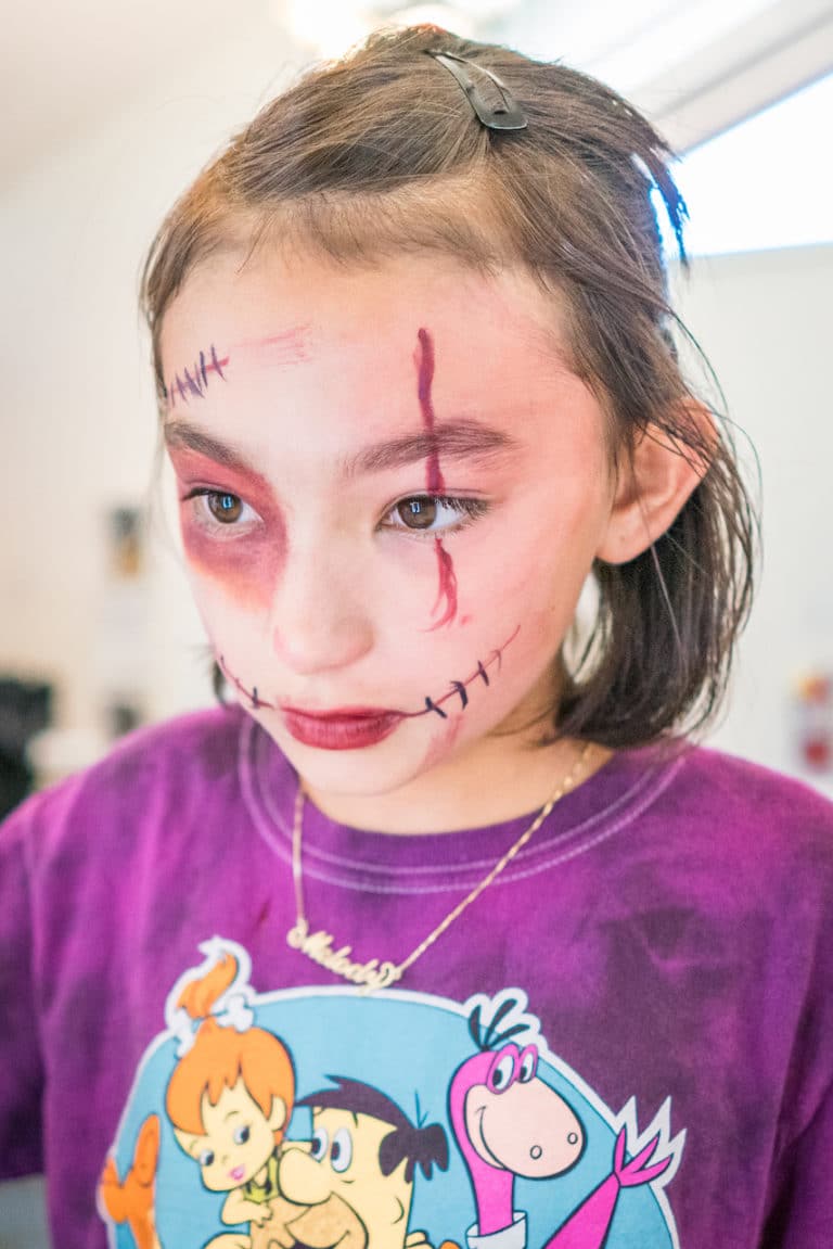 girl wearing zombie makeup